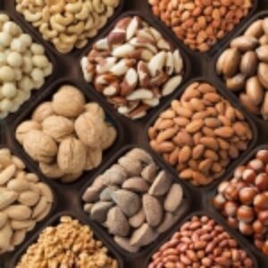 عکس استوک انواع آجیل داخل ظروف چوبی